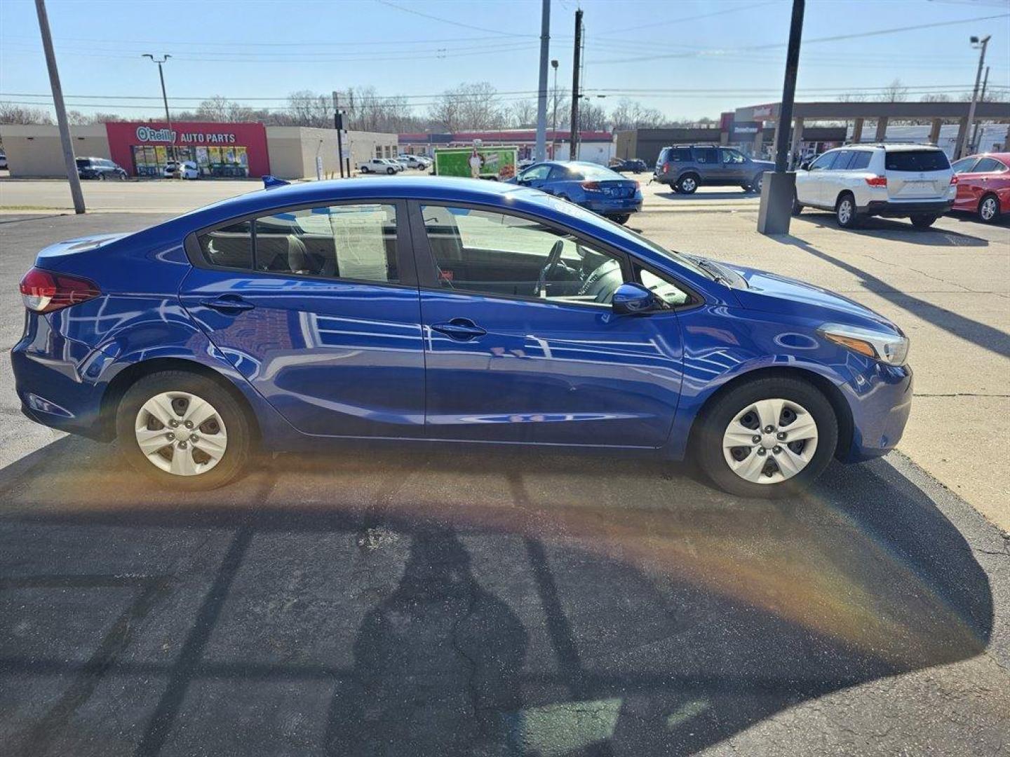 2017 Blue /Gray Kia Forte (3KPFK4A75HE) with an 2.0l I-4 MPI Dohc 2.0l engine, Auto transmission, located at 4163 Bardstown Rd, Louisville, KY, 40218, (502) 266-7677, 38.189991, -85.642418 - 2017 Kia Forte LX. Come see this Kentucky blue beauty. Great looking vehicle with lots of options. - Photo#3