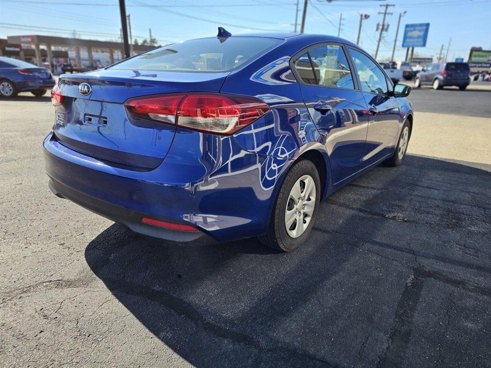 2017 Blue /Gray Kia Forte (3KPFK4A75HE) with an 2.0l I-4 MPI Dohc 2.0l engine, Auto transmission, located at 4163 Bardstown Rd, Louisville, KY, 40218, (502) 266-7677, 38.189991, -85.642418 - 2017 Kia Forte LX. Come see this Kentucky blue beauty. Great looking vehicle with lots of options. - Photo #4