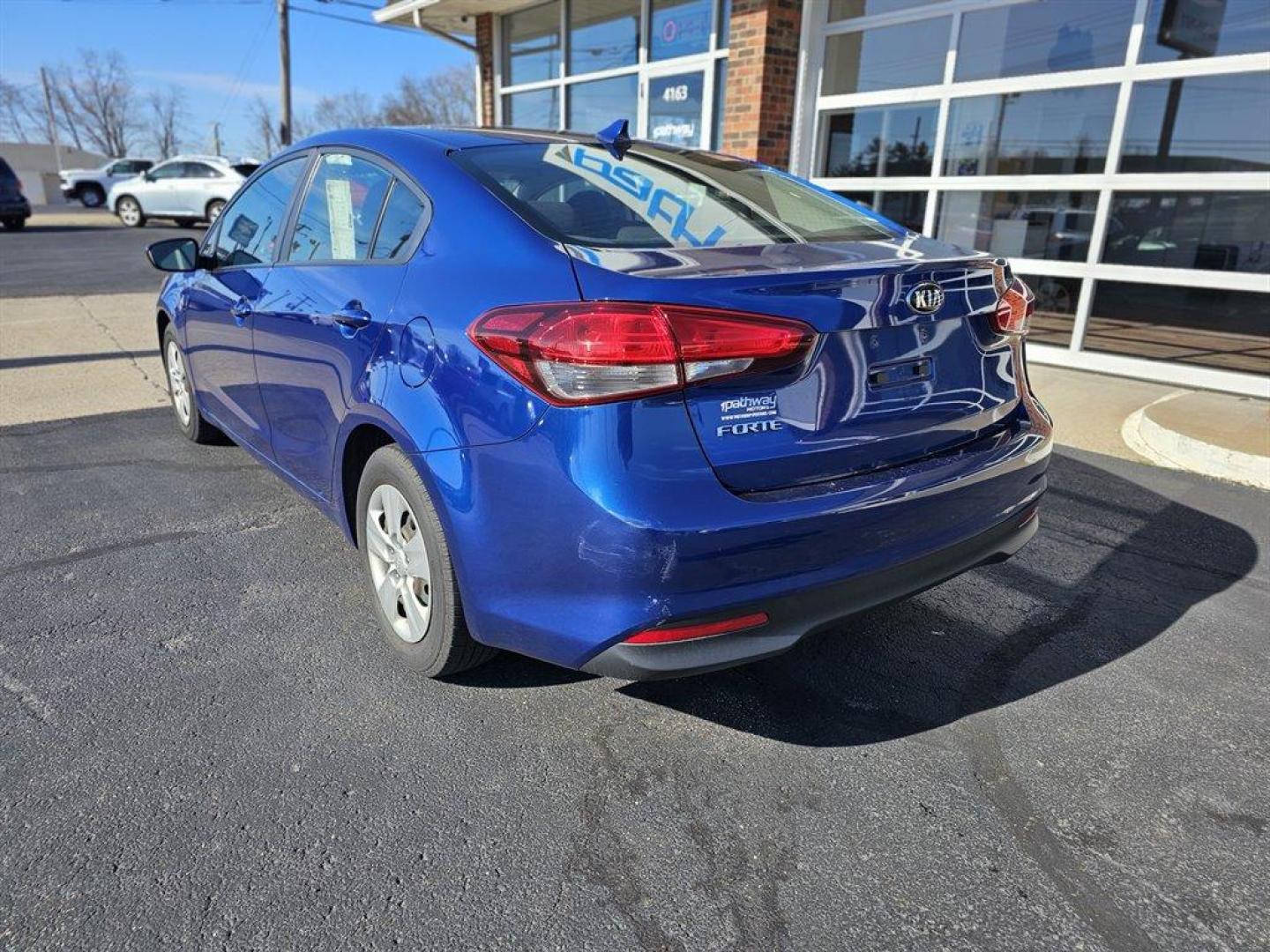 2017 Blue /Gray Kia Forte (3KPFK4A75HE) with an 2.0l I-4 MPI Dohc 2.0l engine, Auto transmission, located at 4163 Bardstown Rd, Louisville, KY, 40218, (502) 266-7677, 38.189991, -85.642418 - 2017 Kia Forte LX. Come see this Kentucky blue beauty. Great looking vehicle with lots of options. - Photo#5