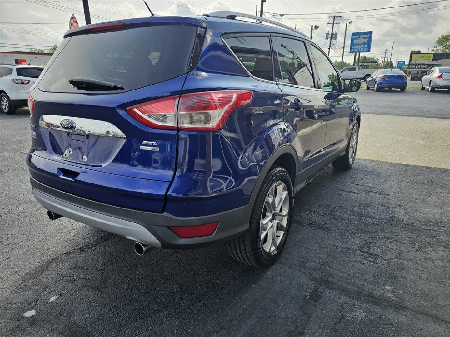 2013 Blue /Black Ford Escape (1FMCU9HX5DU) with an 1.6l I-4 DI Dohc TC Ecobt engine, Auto transmission, located at 4163 Bardstown Rd, Louisville, KY, 40218, (502) 266-7677, 38.189991, -85.642418 - Photo#3