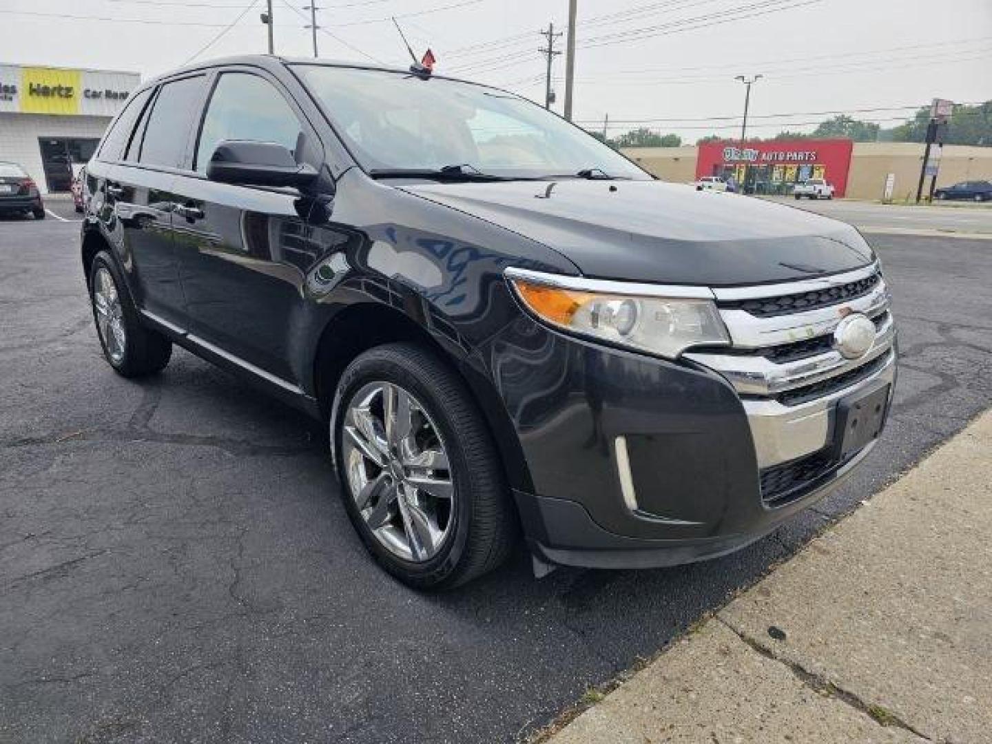 2013 Black /Black Ford Edge (2FMDK3JC6DB) with an 3.5l V6 Smpi Dohc 3.5l engine, Auto transmission, located at 4163 Bardstown Rd, Louisville, KY, 40218, (502) 266-7677, 38.189991, -85.642418 - Deciding on what size of crossover to buy can be tricky. Do you get a large crossover for maximum interior space and roomy third-row seating? Or do you get a small crossover for easier urban maneuverability and higher fuel economy? For some people, the middle ground is the way to go, which is why th - Photo#2