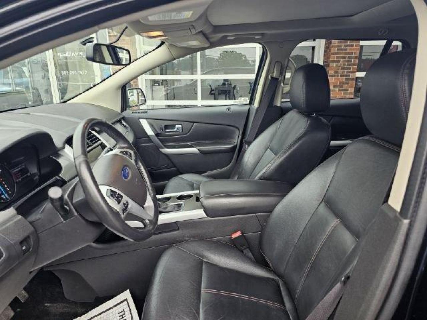 2013 Black /Black Ford Edge (2FMDK3JC6DB) with an 3.5l V6 Smpi Dohc 3.5l engine, Auto transmission, located at 4163 Bardstown Rd, Louisville, KY, 40218, (502) 266-7677, 38.189991, -85.642418 - Deciding on what size of crossover to buy can be tricky. Do you get a large crossover for maximum interior space and roomy third-row seating? Or do you get a small crossover for easier urban maneuverability and higher fuel economy? For some people, the middle ground is the way to go, which is why th - Photo#5
