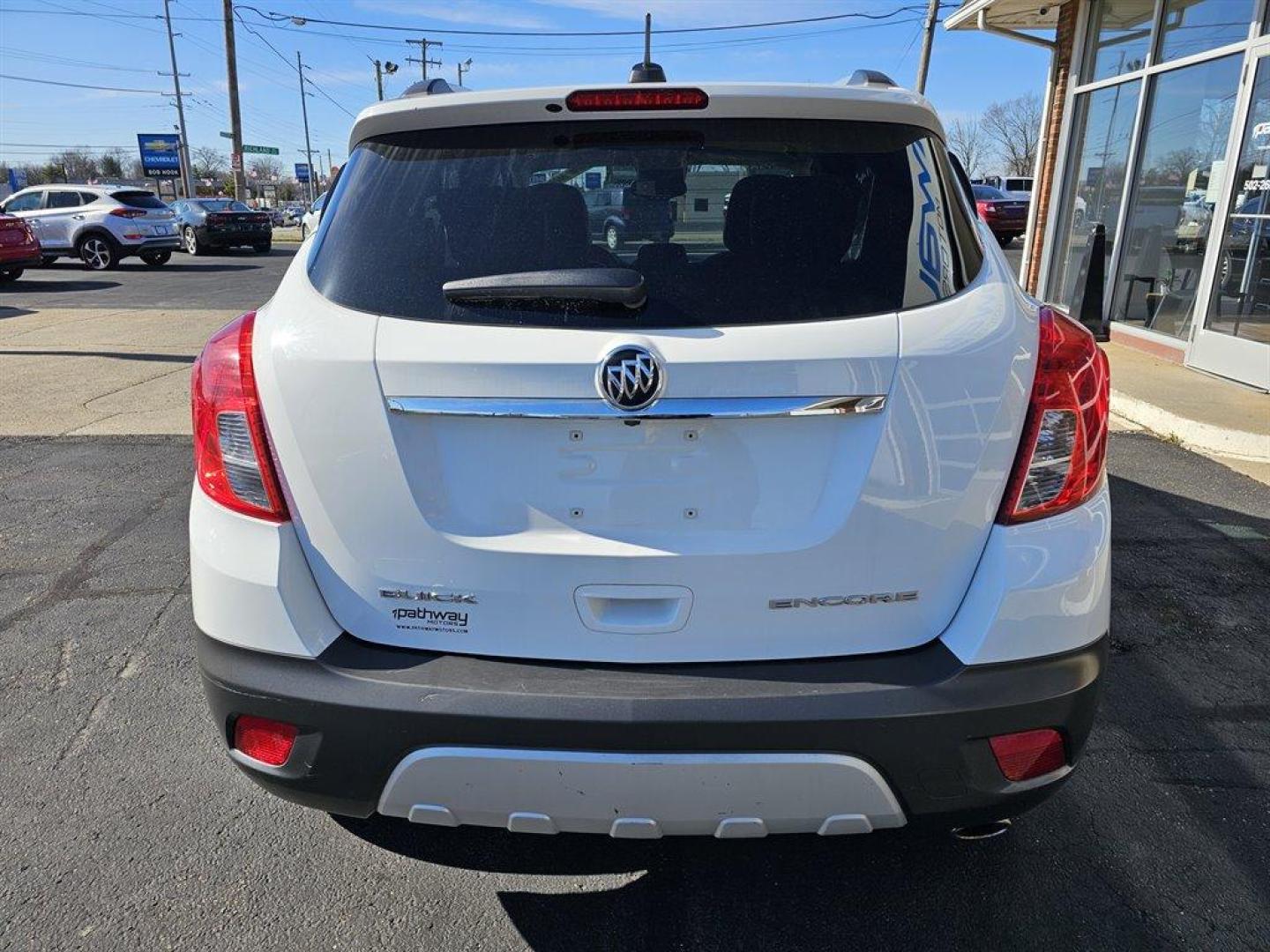 2016 White /Gray Buick Encore (KL4CJBSB7GB) with an 1.4l I-4 MFI Flex T/C HO engine, Auto transmission, located at 4163 Bardstown Rd, Louisville, KY, 40218, (502) 266-7677, 38.189991, -85.642418 - Photo#6