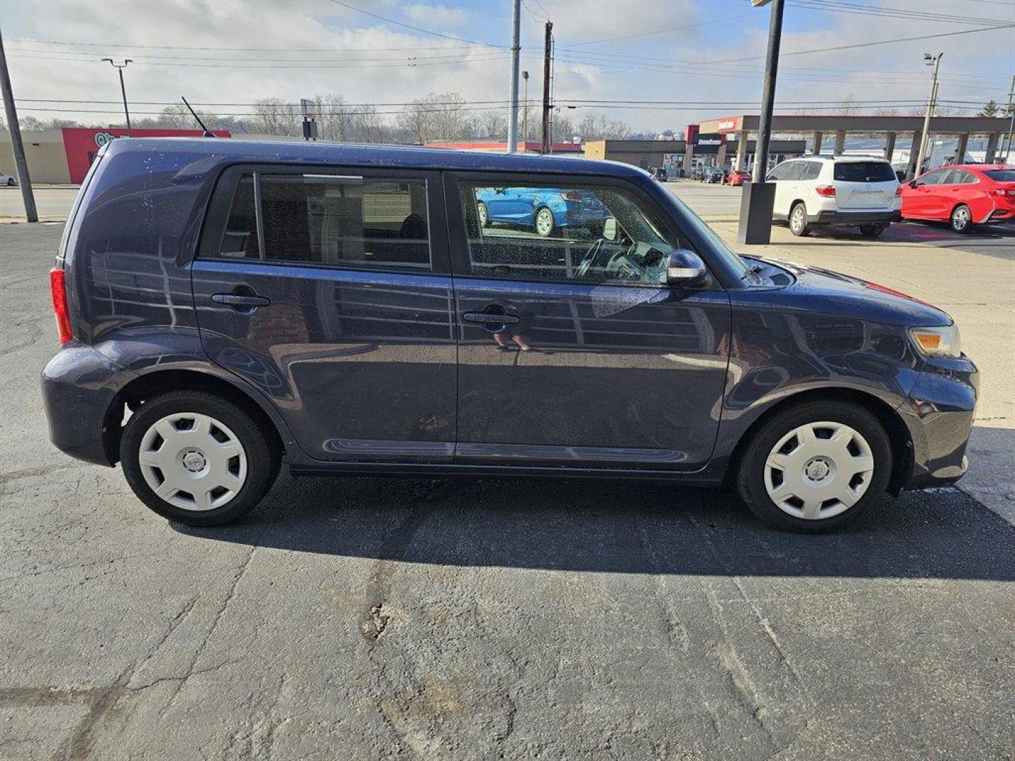 2011 Blue /Black Scion xB (JTLZE4FE6B1) with an 2.4l I-4 EFI Dohc 2.4l engine, Auto transmission, located at 4163 Bardstown Rd, Louisville, KY, 40218, (502) 266-7677, 38.189991, -85.642418 - Photo#4