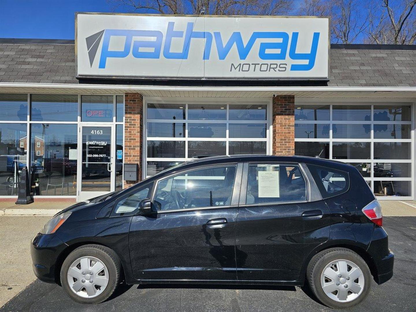 2011 Black /Black Honda Fit (JHMGE8H38BC) with an 1.5l I-4 MPI Sohc Vtec 1. engine, Auto transmission, located at 4163 Bardstown Rd, Louisville, KY, 40218, (502) 266-7677, 38.189991, -85.642418 - Photo#1