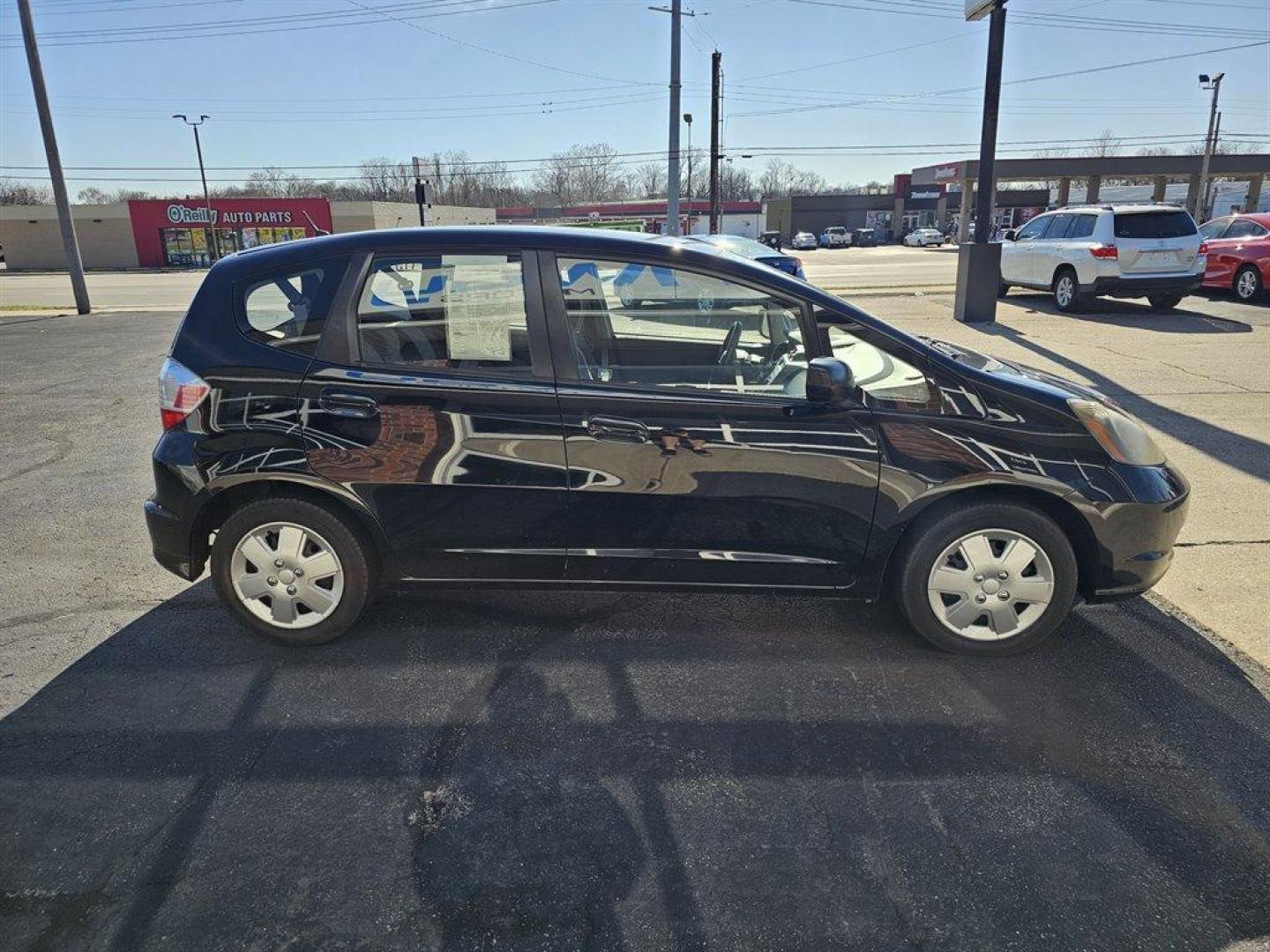 2011 Black /Black Honda Fit (JHMGE8H38BC) with an 1.5l I-4 MPI Sohc Vtec 1. engine, Auto transmission, located at 4163 Bardstown Rd, Louisville, KY, 40218, (502) 266-7677, 38.189991, -85.642418 - Photo#4