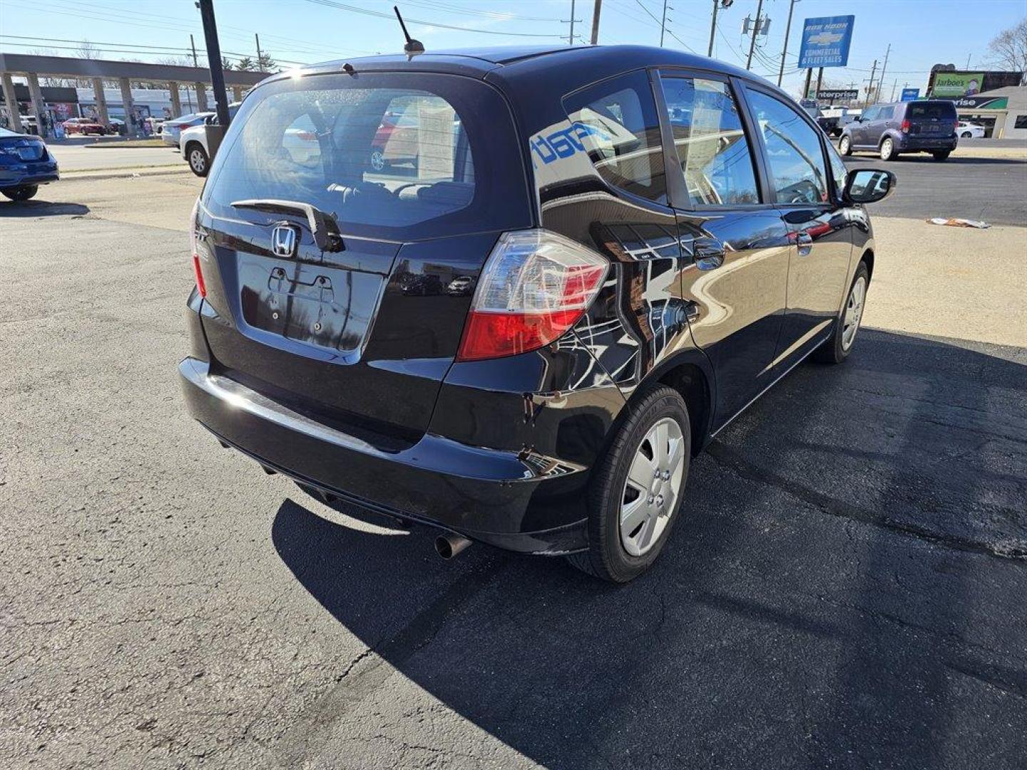 2011 Black /Black Honda Fit (JHMGE8H38BC) with an 1.5l I-4 MPI Sohc Vtec 1. engine, Auto transmission, located at 4163 Bardstown Rd, Louisville, KY, 40218, (502) 266-7677, 38.189991, -85.642418 - Photo#5