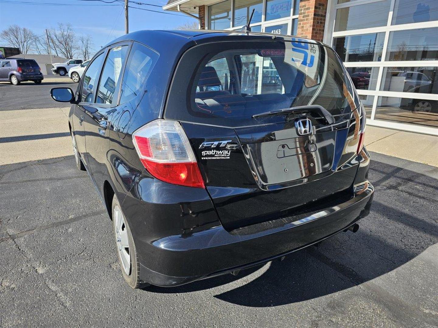 2011 Black /Black Honda Fit (JHMGE8H38BC) with an 1.5l I-4 MPI Sohc Vtec 1. engine, Auto transmission, located at 4163 Bardstown Rd, Louisville, KY, 40218, (502) 266-7677, 38.189991, -85.642418 - Photo#7