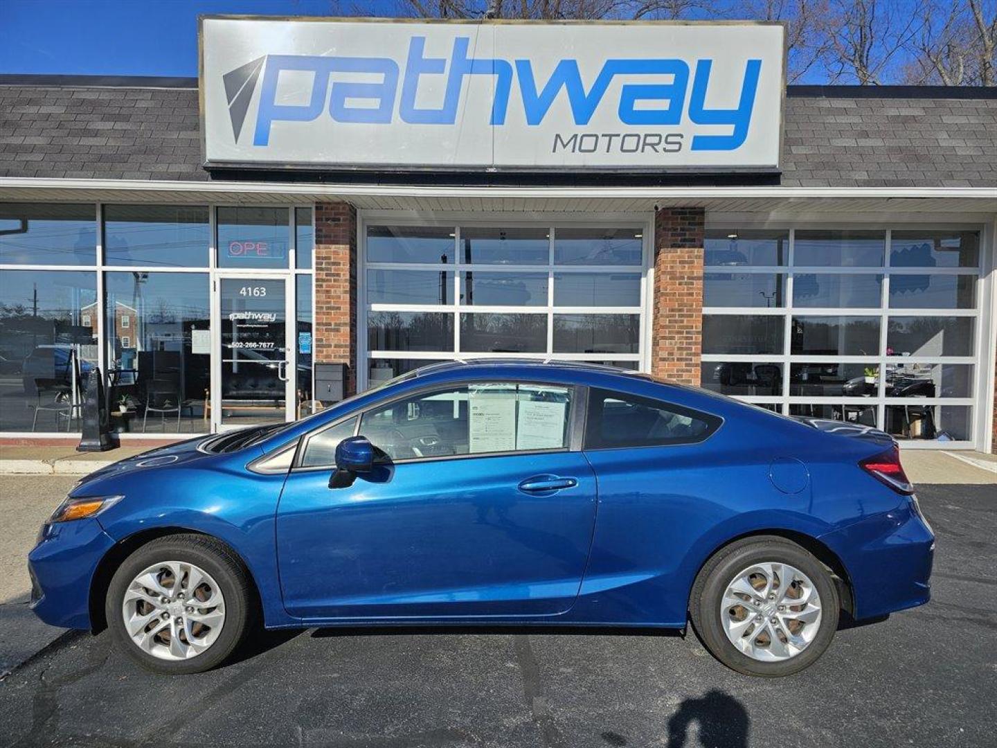 2015 Blue /Black Honda Civic (2HGFG3B56FH) with an 1.8l I-4 MPI Sohc 1.8l engine, Auto transmission, located at 4163 Bardstown Rd, Louisville, KY, 40218, (502) 266-7677, 38.189991, -85.642418 - Photo#1