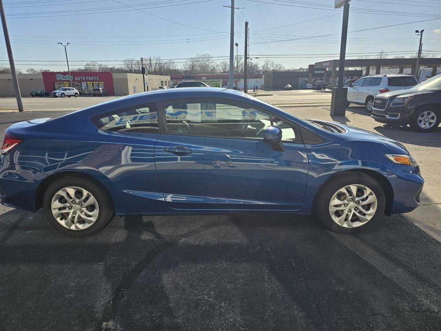 2015 Blue /Black Honda Civic (2HGFG3B56FH) with an 1.8l I-4 MPI Sohc 1.8l engine, Auto transmission, located at 4163 Bardstown Rd, Louisville, KY, 40218, (502) 266-7677, 38.189991, -85.642418 - Photo#4