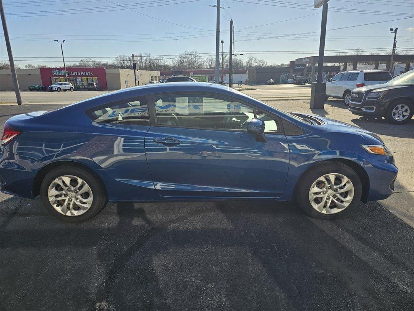 2015 Blue /Black Honda Civic (2HGFG3B56FH) with an 1.8l I-4 MPI Sohc 1.8l engine, Auto transmission, located at 4163 Bardstown Rd, Louisville, KY, 40218, (502) 266-7677, 38.189991, -85.642418 - Photo #4